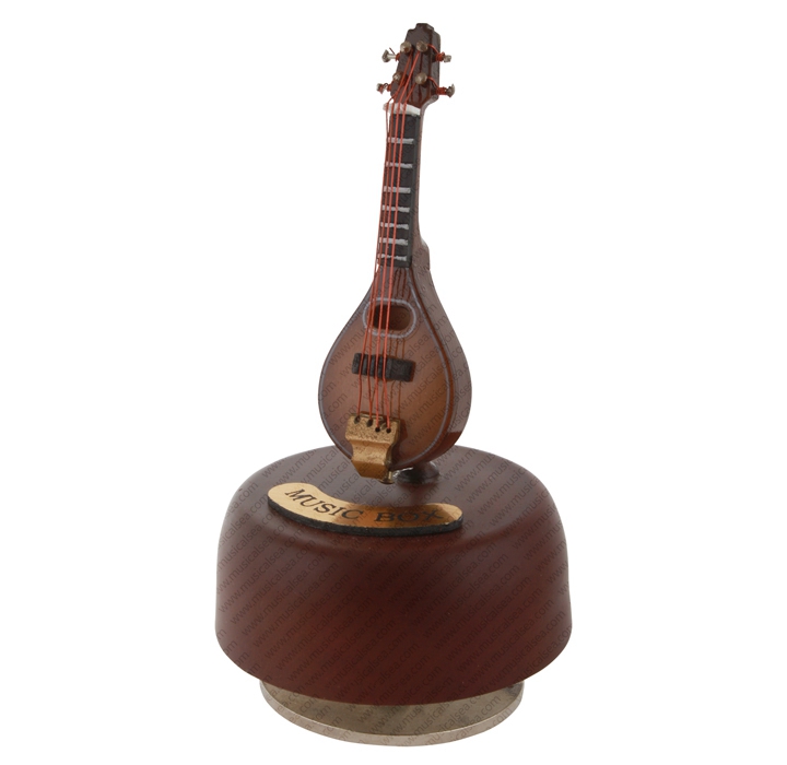 musical instrument figurine music box